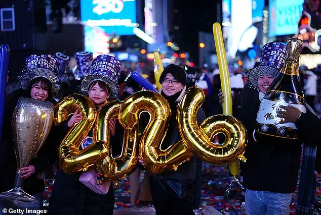 Thousands Gather in Times Square for New Year's Eve Ball Drop Amid Chilly Conditions