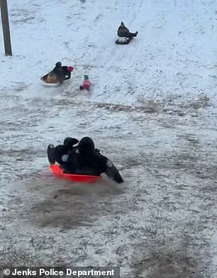 Viral Video Captures Oklahoma Police Officer's Accidental Collision with Child During Snow Day Gone Wrong