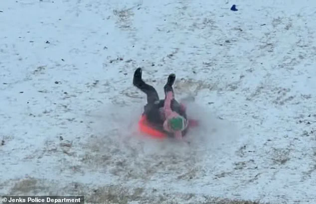 Viral Video Captures Oklahoma Police Officer's Accidental Collision with Child During Snow Day Gone Wrong