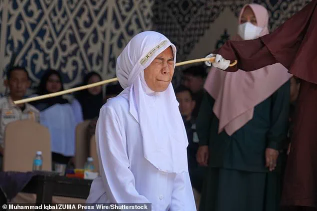 Public Flogging Under Sharia Law in Aceh: Woman Collapses After 140 Lashes for Adultery and Alcohol Consumption