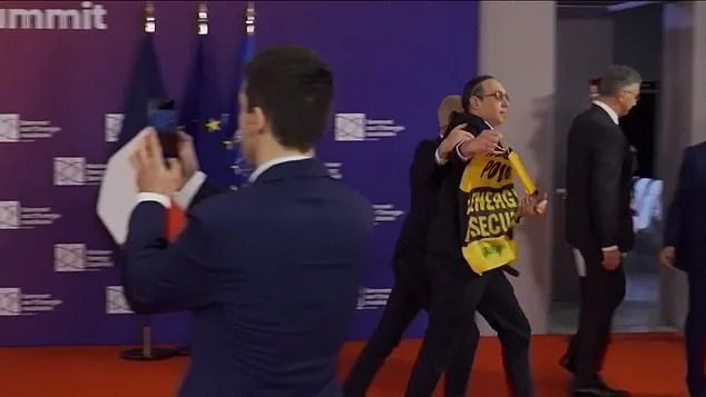 Greenpeace Protesters Confront Macron at Nuclear Summit Over Energy Insecurity and Russia Ties