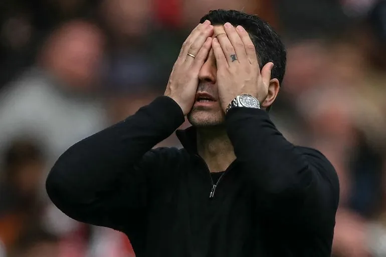 Viral Moment: Manchester City Fan's Sardonic 'Sip' of Arsenal Bottle Ignites Rivalry