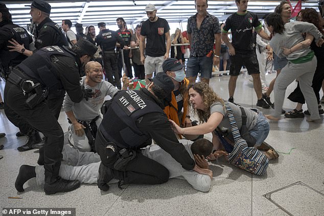 Basque police clash with Gaza activists at Bilbao Airport