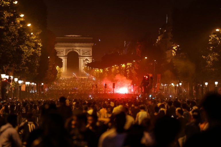 France detains 416 people after PSG Champions League win sparks riots.