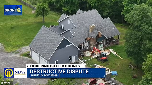 Man Uses Excavator to Demolish Home While Family Inside